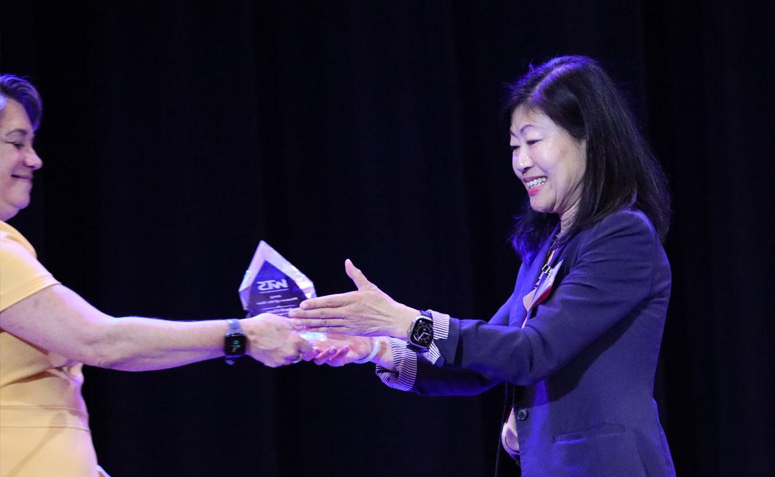 April Chan receiving award