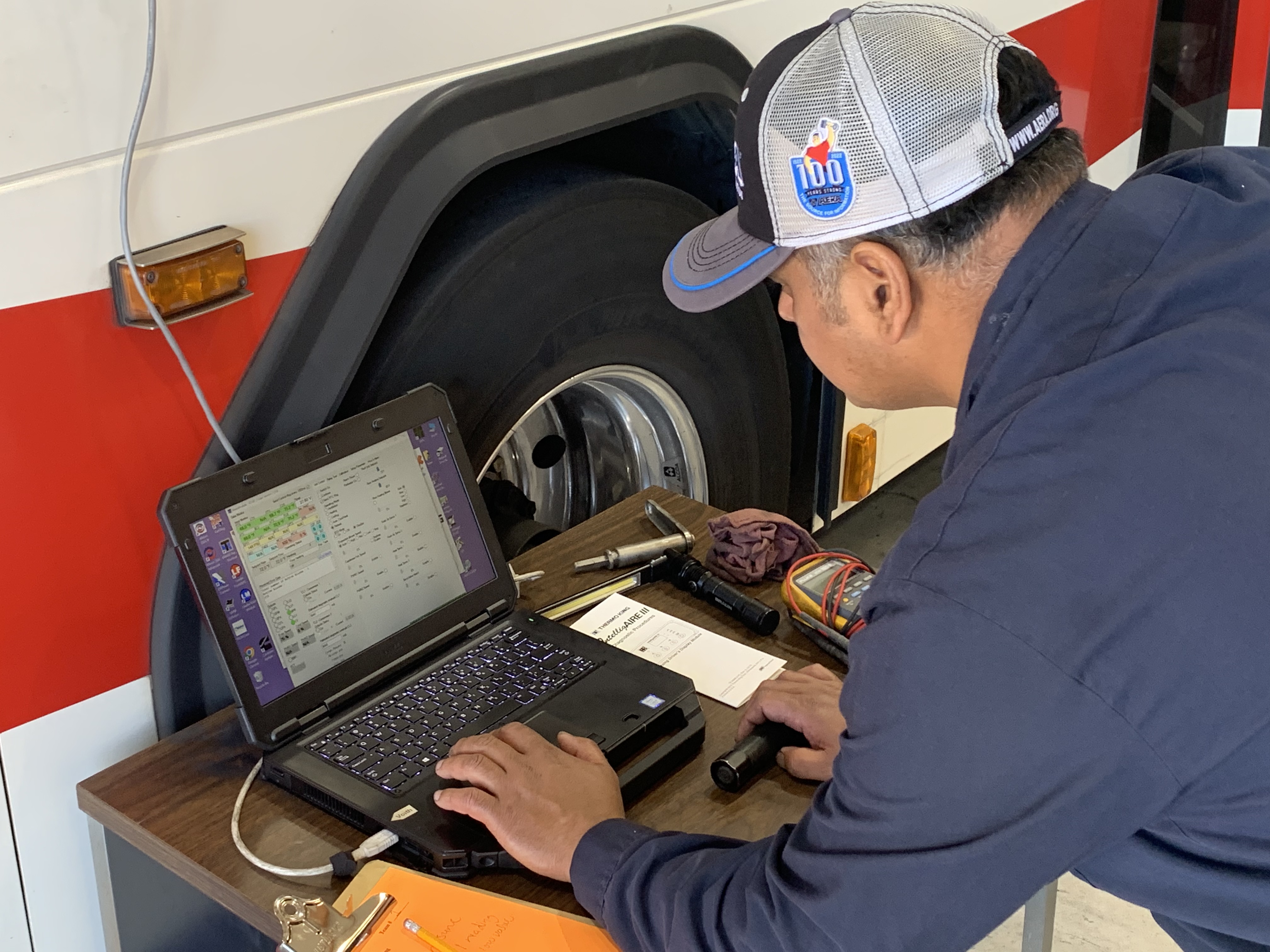 Tech in Action on Bus Using Computer