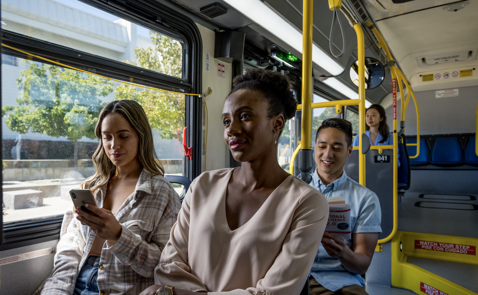 A few passengers riding a SamTrans bus.