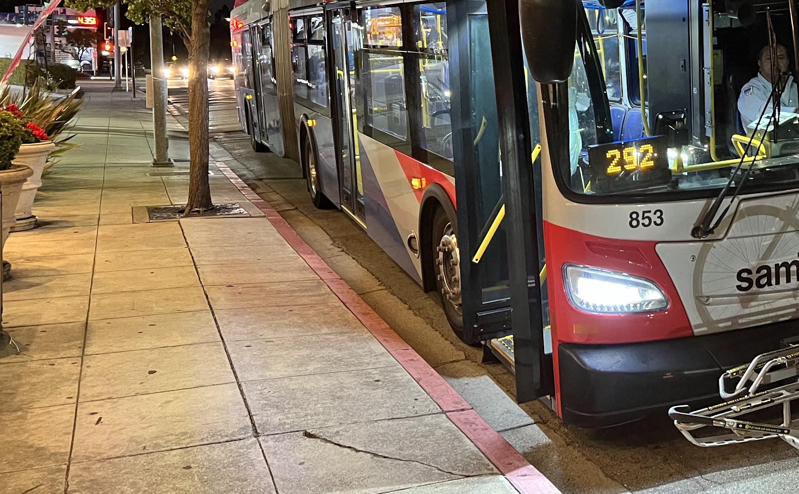 Route 292 at a bus stop on California Drive in Burlingame at night.