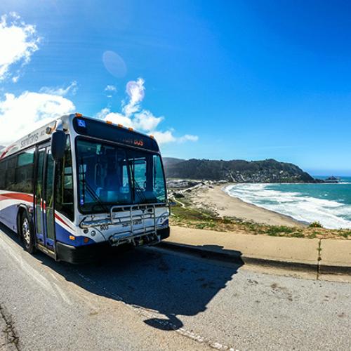SamTrans bus driving a coastside route.