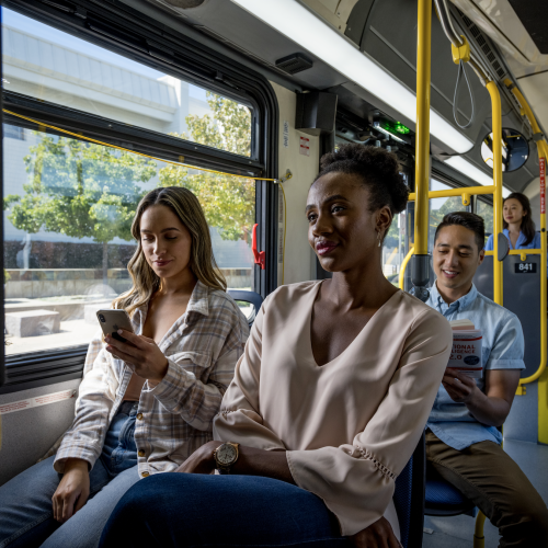 A few passengers riding a SamTrans bus.