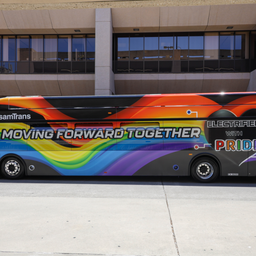 The rainbow-colored Pride bus sits in front of the SamTrans headquarters in San Carlos.
