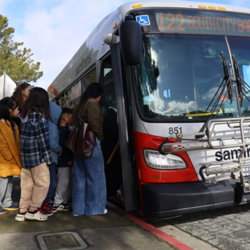 Students boarding a SamTrans bus in South San Francisco.