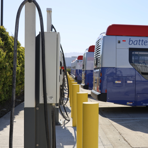 SamTrans bus next to charging station