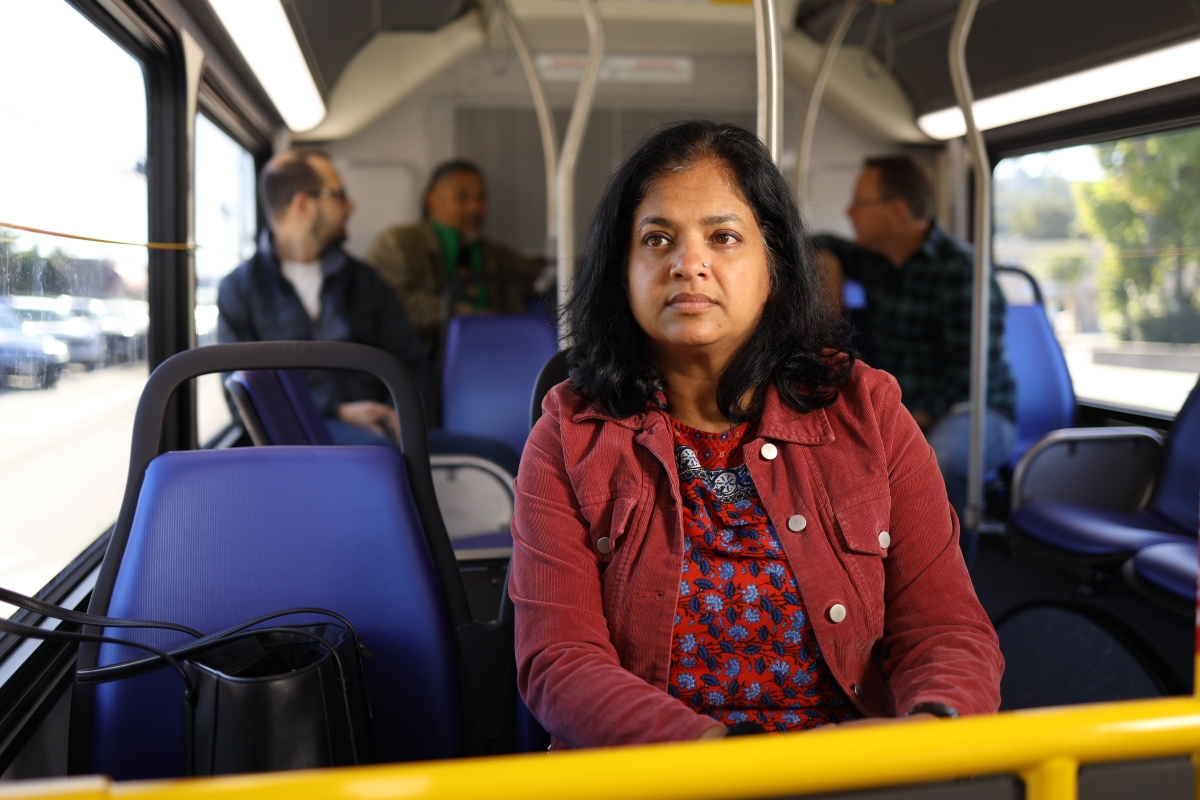 Passenger looks out of window on SamTrans bus