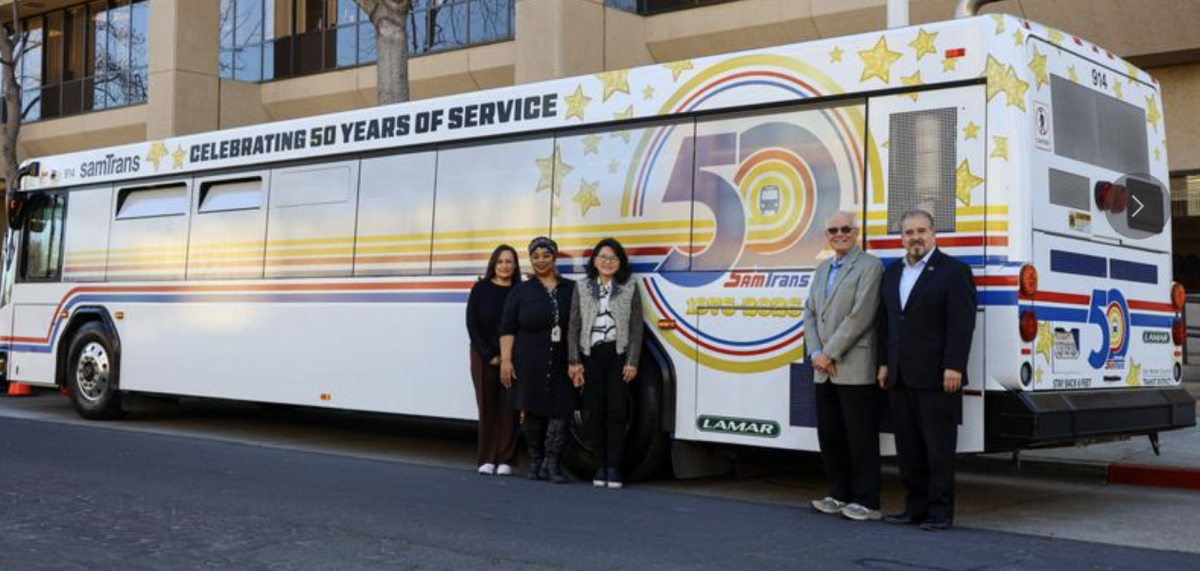 The first of two SamTrans 50th Anniversary wrapped buses is displayed at the agency's headquarters in San Carlos.