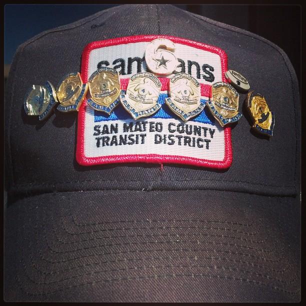 On his SamTrans hat, Bailey wears a '6' pin that signifies to other vets that he's got their back, or 6 o'clock.